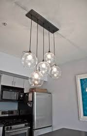 A touch of modern yet classic lighting for your kitchen shall ensure that you never feel alone in the kitchen, whether you are cooking for yourself or all your friends. Kitchen Design Layout Long Pendant Lights 64 Trendy Ideas Diy Kitchen Lighting Hanging Lights Kitchen Kitchen Lighting Fixtures