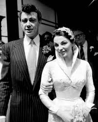She might be referring specifically to the pair of gap jeans. Maxwell Reed Joan Collins Wedding Flashbak