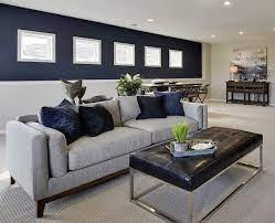 Interior designer dabito's dark navy blue painted walls pair perfectly with the colorful and vibrant orange and yellow accents he added on top! Navy Blue Paint Colors Schneiderman S The Blog Design And Decorating