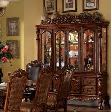 The top cabinet is accessed via two tall, arched doors and is outfitted with clear glass panels on the front. Astoria Grand Welliver Lighted China Cabinet Reviews Wayfair