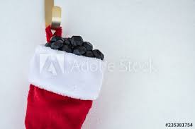 Our giant christmas stockings with toys and other giant seasonal gifts are perfect for businesses in many different industries, including banks, restaurants, car dealerships, supermarkets and more! Close Up Of Traditional Red And White Plush Christmas Stocking Stuffed With Coal Shaped Candy On