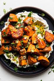 Oven Roasted Sweet Potatoes Recipe With Honey And The Modern Proper Recipe Sweet Potato Recipes Roasted Sweet Potato Side Dish Roasted Sweet Potatoes