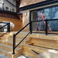 The owners of this nantucket beach house wove a nautical theme throughout keuka studios designed a custom transparent railing for a family in webster, new york that wanted to update their main staircase. Glass Stair Railings Cost Parts Railing Systems Panels