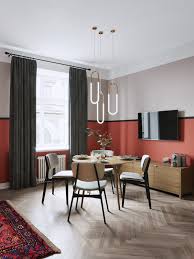 Interior of futuristic dining room with red and grey walls, concrete floor, long wooden table with gray armchairs. Home Designing 51 Red Dining Rooms With Tips And Accessories To Help You Decorate Yours Contemporary Designers Furniture Da Vinci Lifestyle