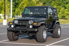 Image result for Brilliant Black 2004 Jeep