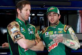 Chase and alan at a drivers meeting. Alan Gustafson Crew Chief Of The Mountain Dew Chevrolet Talks With Chase Elliott Chase Elliot Nascar Cup Series