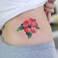 Red Hibiscus Flower Tattoo On The Hip Hibiscus Tattoo Hibiscus Flower Tattoos Hawaiian Tattoo