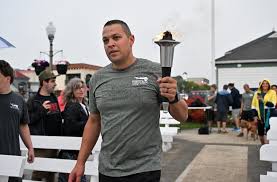 Special Olympics Torch Run ceremony held at Rehoboth Bandstand