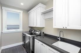 Get rid of it and fill the void with storage loving cabinets. Laundry Room Storage Ideas And Laundry Room Cabinets Indianapolis In