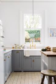 With the integrated recessed handles creating an elegant 3d aesthetic we think this kitchen embodies innovative kitchen design. An Elegant Shaker Kitchen Design With A Classic Villeroy Boch Belfast Sink And Devol Aged Brass Taps Modern Country Kitchens Kitchen Interior Kitchen Design