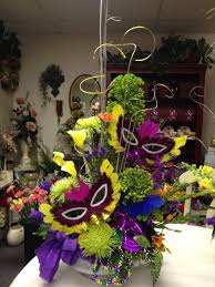 Collection by perfect petals design group. 10 Mardi Gras Arrangements Ideas Mardi Gras Mardi Gras Centerpieces Mardi