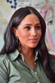 meghan markle just wore her favorite fall color for the third time in 3 months meghan markle hair meghan markle interview meghan markle