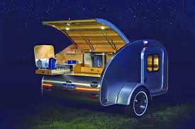 Harley with pull behind motorcycle trailer for pets from bushtec. 8 Best Small Camper Trailers