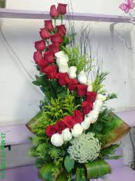 We have a large selection of long stem red and assorted color roses, lilies, daisy's, sunflowers, orchids, tropicals and hard to find flowers wrapped in a bouquet or professionally arranged in a vase. Floreria Betty Blvd Fundadores El Rubi 22626 Tijuana B C Mexico