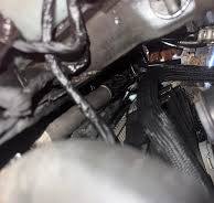 What is the name of the small rubber hose located near the ...