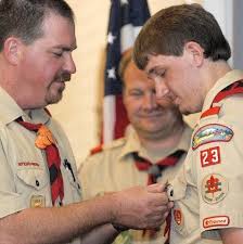 Henderson receives Eagle Scout badge, honors family members
