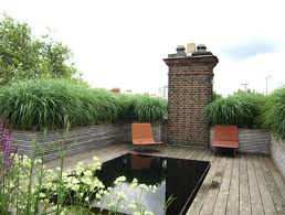 Rooftop Garden It Is Unusual To Find A Large Flat Roof In Central London With Such Good Views And A Purpose B Rooftop Garden Roof Garden Backyard Landscaping