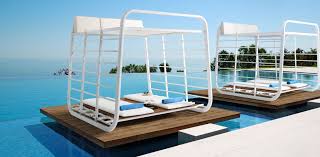 Transform your outdoor space into a cozytransform your outdoor space into a cozy oasis with this cushioned daybed from the noble. Auta 2 Teak Cabana Daybed