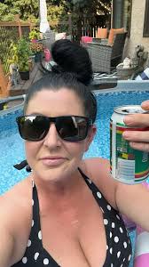 Enjoying 34C heat in Canada, poolside