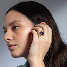 An 18 Carat Gold and Cabochon Cut Amehtyst Fred Ring For Sale at 1stDibs