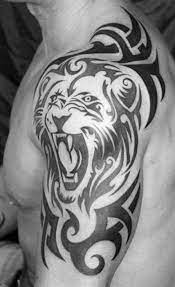 50 Lion Shoulder Tattoo Designs For Men Masculine Ink Ideas Tribal Arm Tattoos Tribal Tattoos For Men Arm Tattoos For Guys