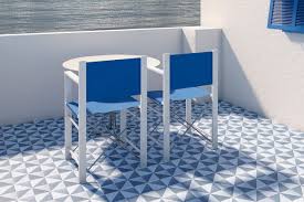 A backsplash of granada tile company's cluny cement tile makes an outdoor barbecue sizzle. Azulejos Para Patios Exteriores Cevica