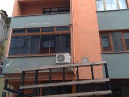 Made from glass, wood and stone, it is a tribute to the nature. Glass Balcony