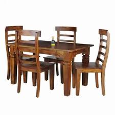This modern dining table has a white mdf top and a high gloss white. Odyssey Solid Wood Four Seater Dining Table Set Honey Finish Brown By Hariom Inc Id 4570814