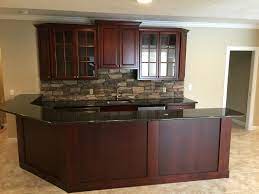 More thought goes into the countertop, cabinets, appliances and layout of a kitchen, but one detail that anyone building or remodeling a kitchen shouldn't overlook is the backsplash. Cherry Cabinets With Stone Backsplash Traditional Home Bar Other By Shier Signature Home Llc Houzz