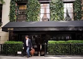 Hedge And Fence Long Black Awning With Shop Name Could Be Address Numbers Facade Design Awning Outdoor Restaurant
