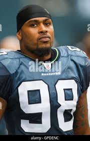 Seattle Seahawks Raheem Brock (98) and Brandon Mebane (92) celetrate  sacking Carolina Panthers quarterback Jimmy Clausen in the second half of  an NFL football game, Sunday, Dec. 5, 2010 in Seattle. (AP