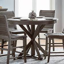 A counter table set or pub table is approximately 36 high table, and is mainly used in kitchens or dining rooms. Willow Round Counter Height Table Distressed Gray By Progressive Furniture Furniturepick
