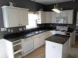 White Kitchen Cabinets With Black Countertops Design Decorating 714732 K Black Kitchen Countertops White Cabinets With Granite White Cabinets White Countertops