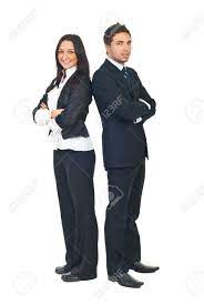 Full Length Of Two Young Business People Standing Back To Back With Hands Crossed Isolated On White Background Stock Photo Picture And Royalty Free Image Image 8333140