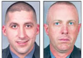 Troopers fired for Klan costume reinstated by arbitrator