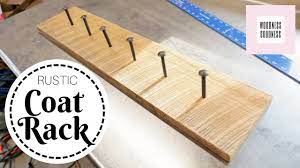 For the cute braces on the rack, we cut 4 pieces of 2×4 both ends at 45 degree angles @ 13″ long point to long and we attached it to the top of the coat rack with wood glue and 2 1/2 inch wood screws. Easy Diy Rustic Coat Rack Youtube