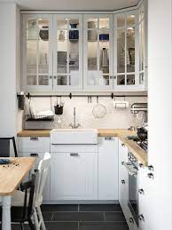 White kitchen with streamlined ikea units and granite worktops. Mittled Led Kitchen Worktop Lighting Strip Dimmable White 80 Cm Ikea