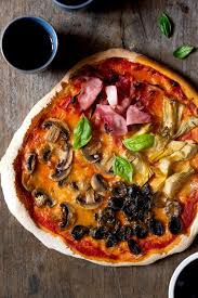 Quattro Stagioni Pizza Four Seasons Pizza Recipe Made With Artichokes Mushrooms Ham And Olives An Auth Italian Recipes Seasons Pizza Italian Dinner Recipes