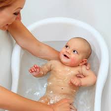 The blooming baby bath, which is shaped like a lotus flower, is made from polyester plush, and fits in most sinks. 6 Reasons To Delay Your Babies First Bath Blue Lotus Fertility
