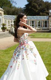 White wedding dress with colored flowers. Boldly Boho Embroidered Wedding Dresses With Colourful Florals
