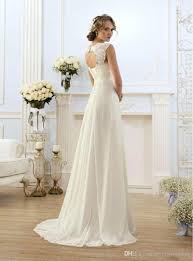 Choosing dresses for your fantasy beach wedding should be curbed with a touch of practicality. Discount 2016 New Romantic Beach A Line Wedding Dresses Cheap Maternity Cap Sleeve Keyhole Lace Up Backless Chiffon Summer Pregnant Bridal Gowns Dress Wedding High Street Wedding Dresses From Loverrrwedding 119 6 Dhgate Com