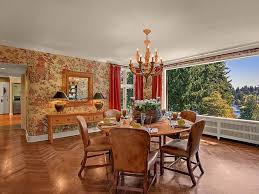 The dark inky blue grey paint colour works, despite the low ceiling height because of the large window. 28 Sleek English Country Dining Room Design Ideas