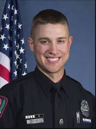 OSU officer Alan Horujko, 28, shot and...