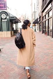 Winds blow sand all around, so a camel has long eyelashes. The Camel Coat Carmeon Hamilton