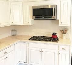 White isn't just a beautiful color choice, it's also incredibly functional. Maple Cabinets Stained In White Tinted Lacquer Classic Refinishers