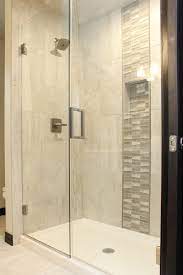 Artists and tile designers have done amazing things with glass tile. Ivory Tile Shower Glass Grey And Brown Tile Accent With Glass Shower Door Shower Tile Tile Accent Wall Shower Accent Tile