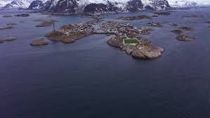 Compare reviews of sea bass and tuna. Henningsvaer Village And Mountains In Winter Lofoten Norway Aerial View By Whitemountmedia