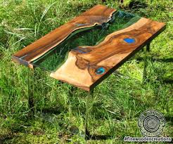 Live edge or natural edge wood has become increasingly popular in the furniture industry lately. Live Edge River Coffee Table Blue Hole Glowing In The Dark With Stainless Steel Legs Fine Wooden Creations