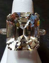 Replica Of Elizabeth Taylor S Wedding Ring The Main Gem Is A Colorless Texas Topaz I Faceted The Gem Wedding Rings Jewelry Topaz