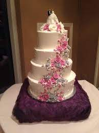 Cascading Fuchsia Silver Rose Wedding Cake By Ye Olde Pie Shoppe Call For A Free Consult 732 530 3337 Wedding Cake Roses Cake Custom Cakes
